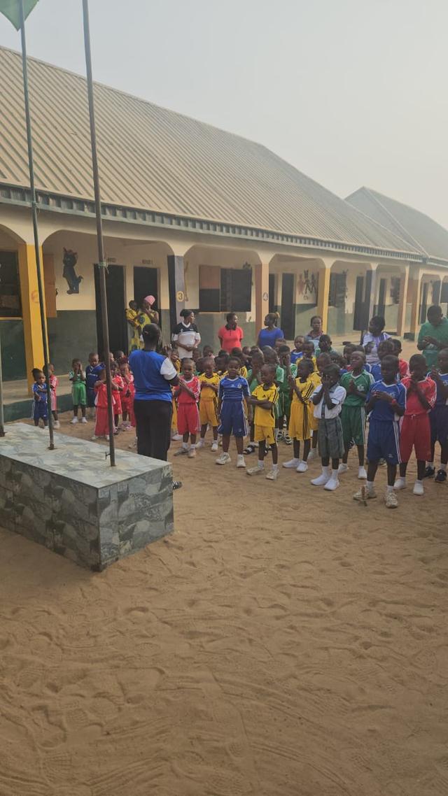 Pupils gathered on the TBD International Academy compound in Kertyo for morning assembly